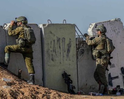 Soldiers at a forward defensive position behind blast walls